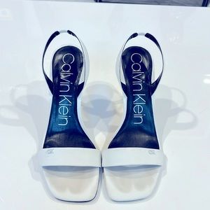 White Calvin Klein heels